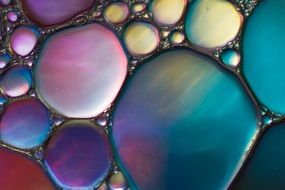 colorful oil stains on the water as background
