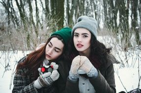 young models in winter forest