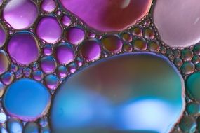 colorful oil circles of different sizes