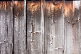 wooden planks on the wall of the barn