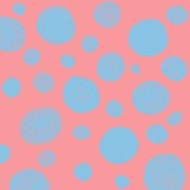 blue spots on a pink background