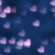 illuminated hearts on a dark blue background