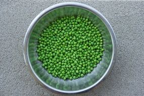 fresh green peas in the bowl