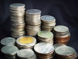 coin towers on a dark background