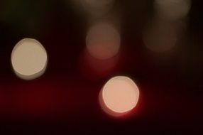 dark red blurred background with highlights of light