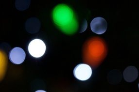 glare on black blurred background