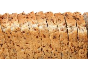 bread sliced into pieces on a white background