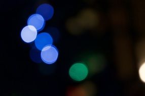 blue highlights on a dark blurry background