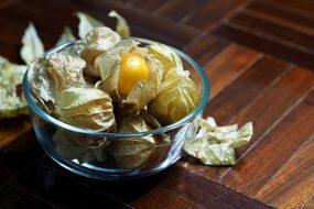 delicious physalis fruits in the glass bowl