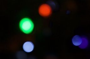 mugs of different colors on a blurred background