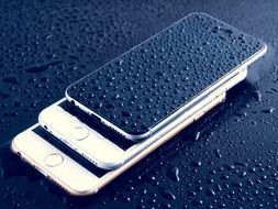 iPhones on the wet surface