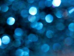 pixel circles on a blue abstract background