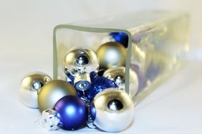 Christmas decorations in vase as background