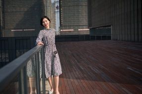 young asian woman in floral dress