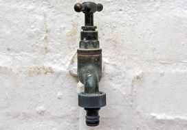 water faucet in the wall