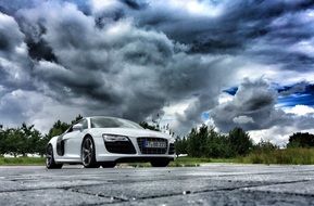 audi R8 car in thunderstorm