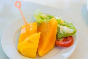sliced mango on a plate
