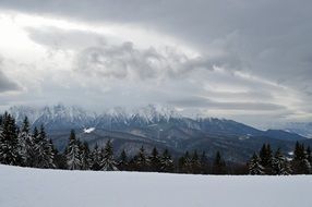 winter landscape on the mountain under the clouds