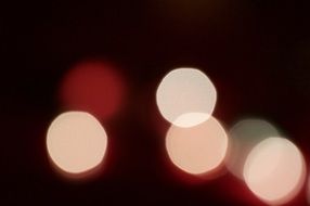 light glare on dark red background