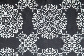 grey wallpaper with white floral pattern