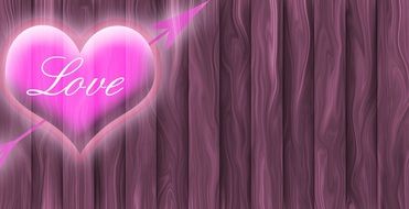 pink heart with an arrow on a wooden background