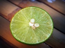 lime slice on wooden table