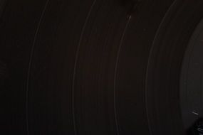 black vinyl record with lines