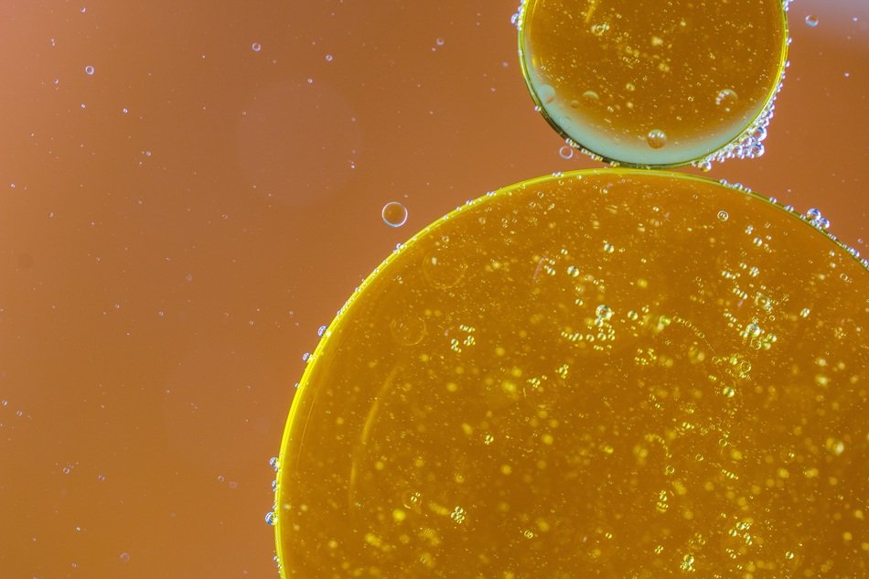 yellow oily spots on orange background