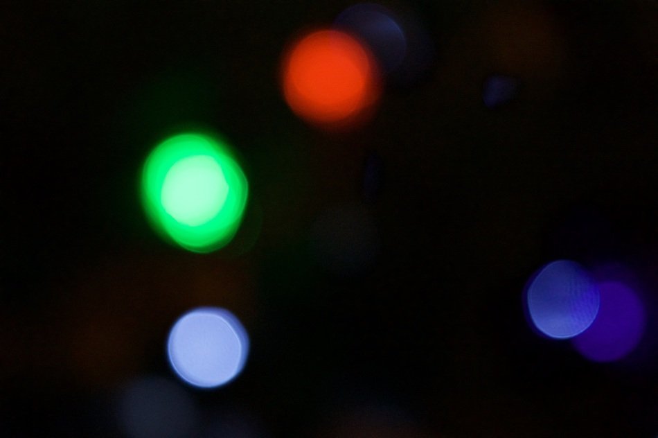 mugs of different colors on a blurred background