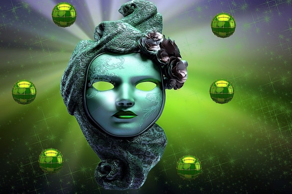 carnival mask and green balls on the wallpaper
