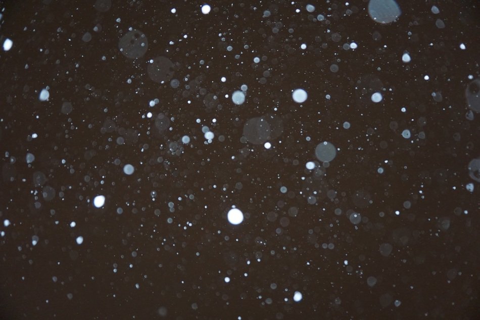 white dots on black background