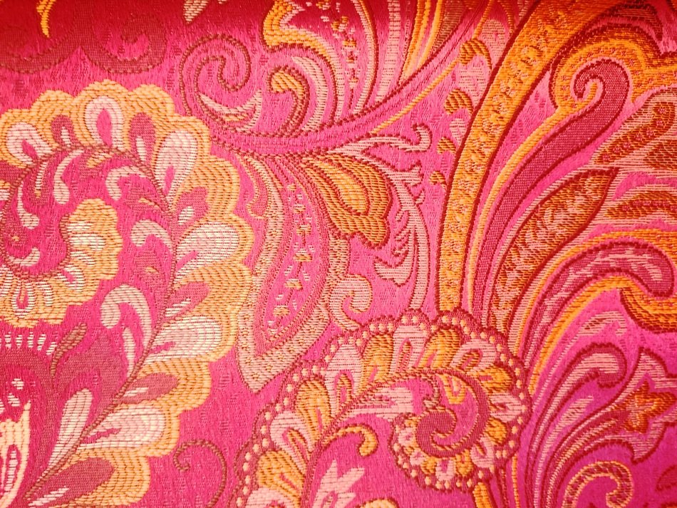 yellow pattern on red wallpaper