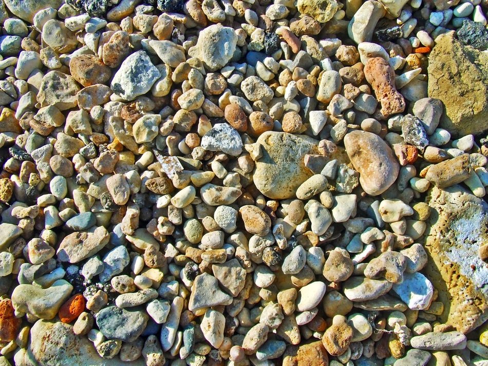 background with natural pebbles on the shore