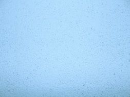 light blue background with particles