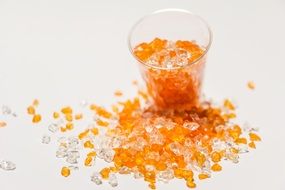 orange and transparent tiny glass stones