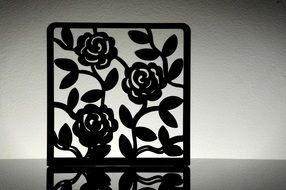 black frame with rose pattern