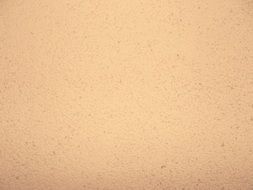 Clipart of peach background with small particles