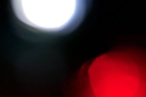 red and white highlight light on a black background