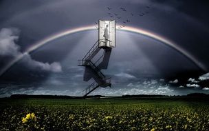 rainbow behind the stairs with man