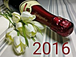 flowers near the champagne bottle