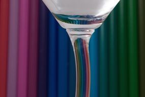 glass on the colored pencils background