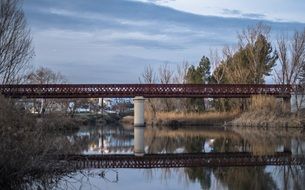 metal bridge across the river