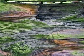 green painted weathered wooden boards close up