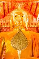 golden buddha statue in buddhist temple