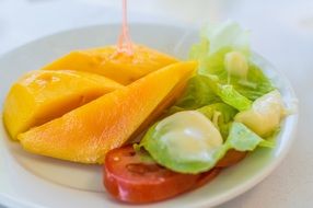 sliced mango with vegetables