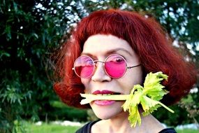 redhead woman with green