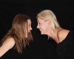 photo of laughing mom and daughter