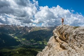 happy Person on Mountain Top in gorgeous landscape, Achievement concept