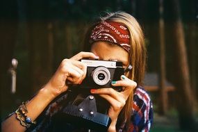girl with a camera in hand