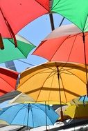 umbrellas of different colors on the street